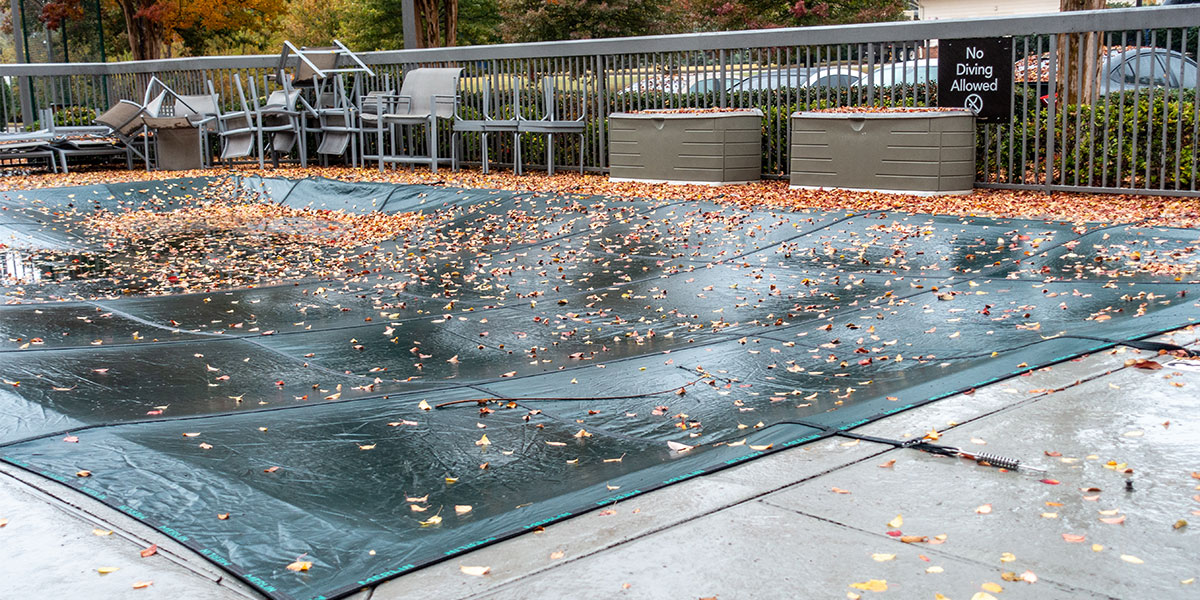 Covered Concrete Pool Deck Wet from Winter Rains